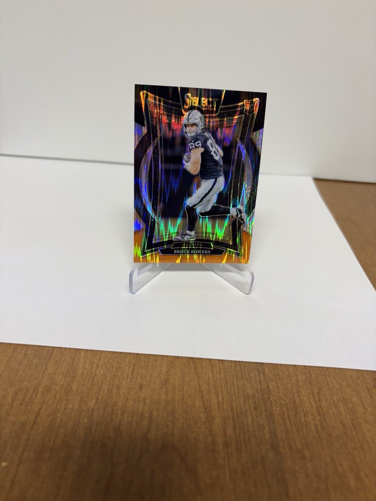 2024 Panini Select - Concourse Brock Bowers #31 Black & Orange Shock Prizm (RC)