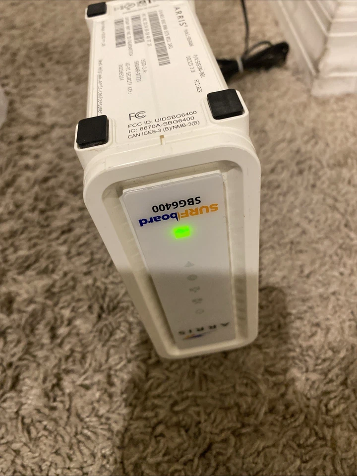 Combo de cable módem router WiFi ARRIS SBG6400 - módem + adaptador de corriente solamente Foto 3 de 4