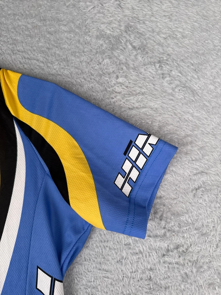 Jersey de ciclismo trasero para mujer mediano 3 azul amarillo 1/2 cremallera manga corta poliéster Foto 2 de 4