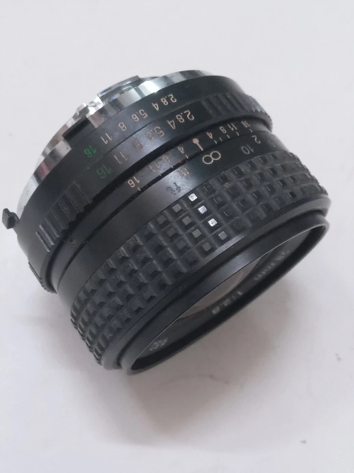 Lente gran angular RMC TOKINA 28 mm F2,8 en montura Minolta MD buena pero leída Foto 4 de 4