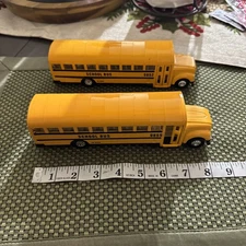 Sunnyside SS#9853 Yellow Die Cast School Bus 8” Long Opening Doors read below 