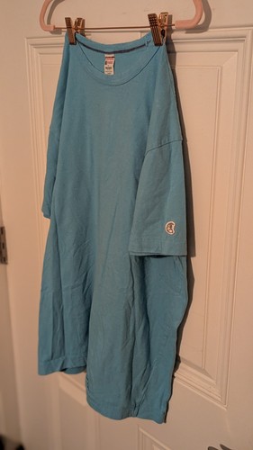 True vintage 1980s Champion Deadstock blue ringer neck single stitch T-shirt.