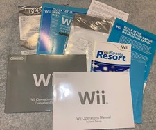 Large lot of Wii Paperwork - Operations Manual