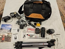 Canon AE-1 Program 35mm Film Manual Camera + 4 lenses, 2 flashes, tripod, case