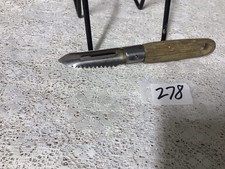 A WOOD HANDLE  POINTED PEELER #278