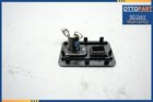 Black 2007-2012 Lexus LS460 LS460L center console auxiliary adapter with yellow top plate and visible wiring.