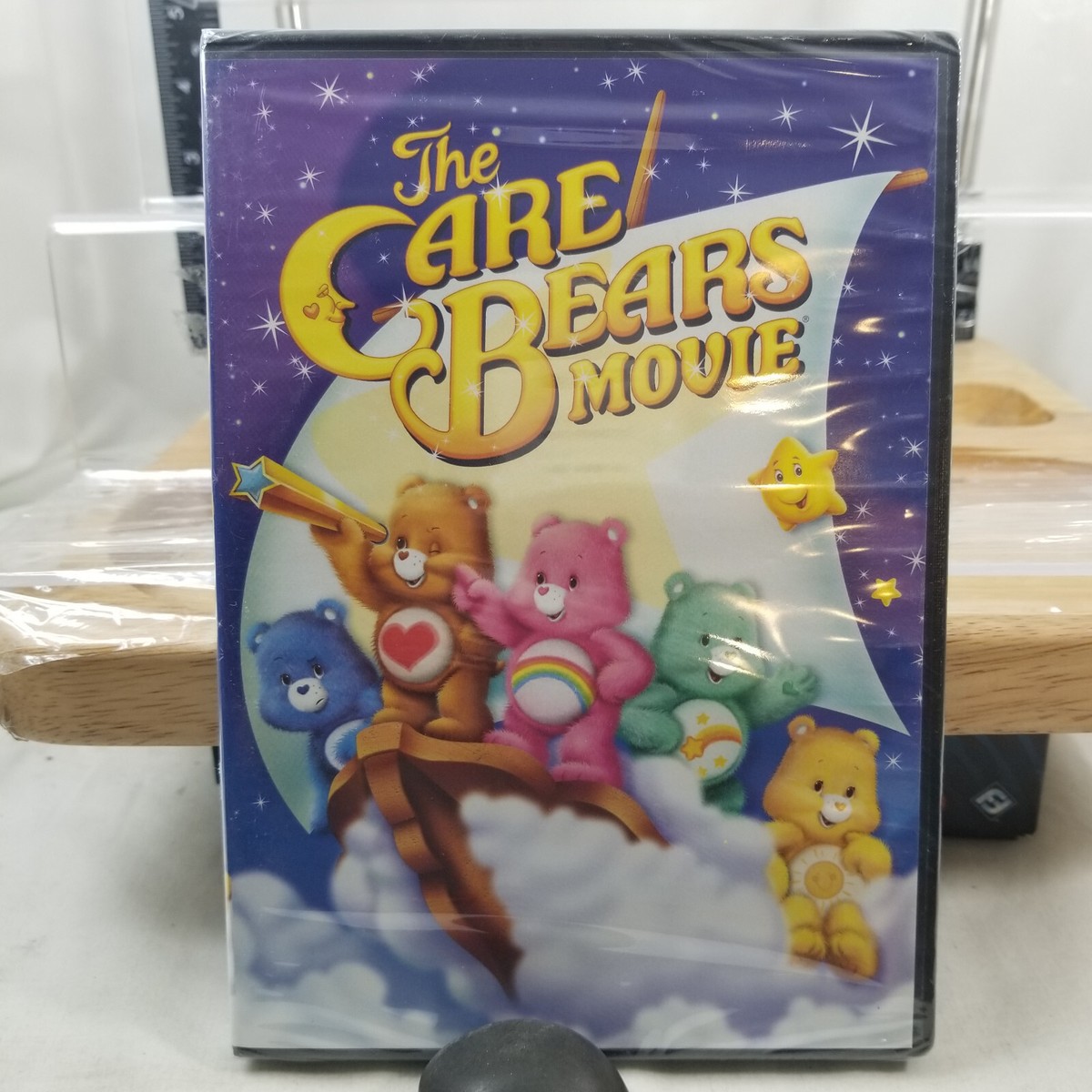 The Care Bears Movie DVD Bears watch over earth in clouds rainbows