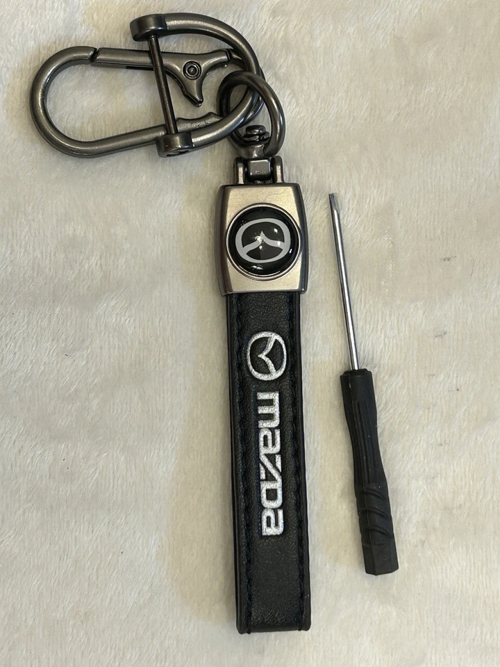 Mazda Leather Keychain And Set Of 4 Valve Stem Caps - Image 4 of 4