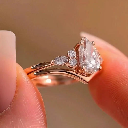 14K Rose Gold Plated 2.70 CTW Pear Cut D/VVS1 Moissanite Matching Band Ring Set - Picture 2 of 9