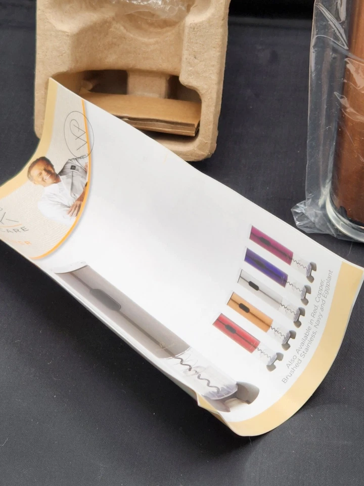 Abridor de vino eléctrico Wolfgang Puck plateado - Cortador de láminas - Funciona con pilas Foto 3 de 4