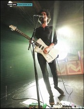 Omar Rodriguez Lopez St. Vincent Ernie Ball Music Man guitar pin-up photo