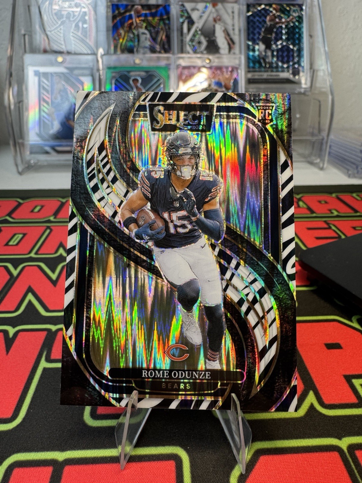 2024 Panini Select - Premier Level Rome Odunze #136 Zebra Prizm (RC)