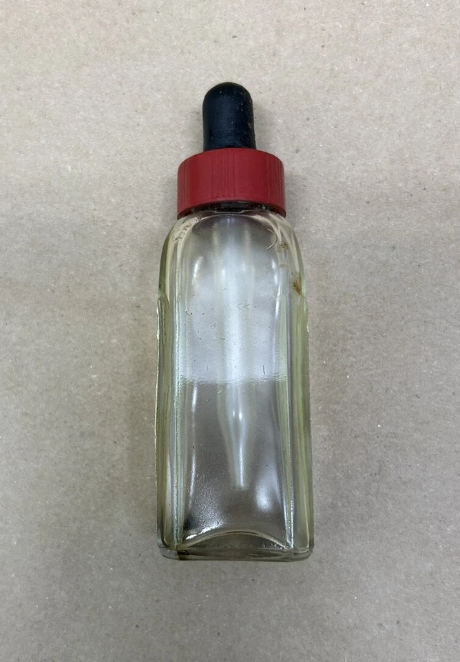 Botella de vidrio con cuentagotas de aceite vintage Buescher Valve Foto 3 de 4