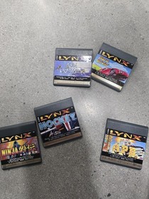 Atari Lynx Console with Game Cartridges, and  Carrying Case & Power Adapter