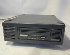 Quantum BRSLA-0704 Tape Backup External Drive, powers on, untested, with cable.