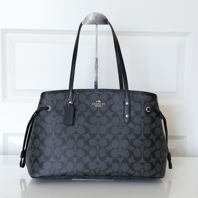 coach signature drawstring carryall
