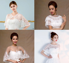 Short ivory bridal lace Bolero cape ideal for a wedding with a beaded cover.