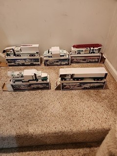 A collection of Hess trucks 1988 Two 1995 5 trucks total open. For photographs