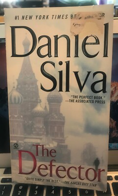 THE DEFECTOR BY DANIEL SILVA PAPERBACK #1 NYT BESTSELLER, SPIES & INTELLIGENCE!