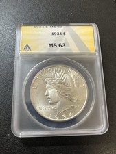 1934 PEACE DOLLAR ANACS MS63 - UNCIRCULATED - WHITE LUSTER - CERTIFIED SLAB - $1