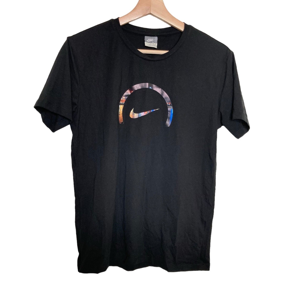 nike gold swoosh t shirt