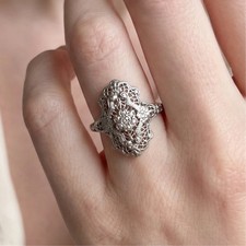 Antique art deco diamond shield ring in 18k white gold