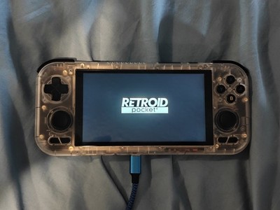 Retroid Pocket 4 Pro Handheld System Console Crystal w/ Grip & Case. DESCRIPTION