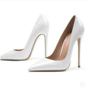 white pointed toe heels