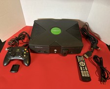 Xbox Original Console. Controller. AV/Power Cables DVD Dongle/Remote. Works