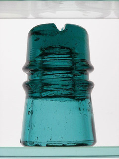 CD 141 [10] No embossing dark aqua cross top glass insulator