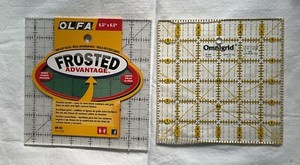 Omigrid Quilting Ruler 6 X 6 (used), Olfa ruler 6 1/2 X 6 1/2 (new)