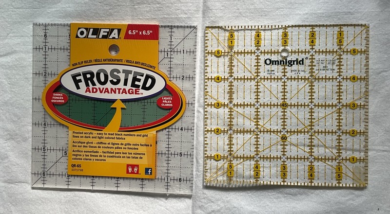 Omigrid Quilting Ruler 6 X 6 (used), Olfa ruler 6 1/2 X 6 1/2 (new)