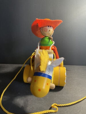 Vintage Sevi Italy wooden and felt cowboy riding horse pull toy