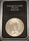 1923 PEACE SILVER DOLLAR - SLABBED COIN  (7662)