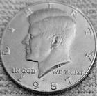 1- 1987 D Kennedy half dollar coin