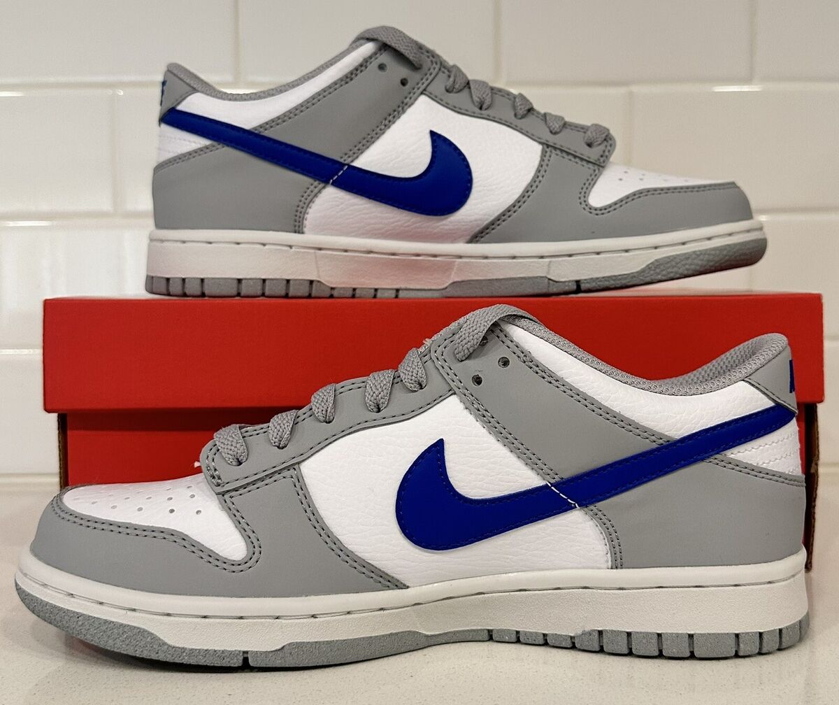 This Nike Dunk Low Features Mini Swoosh Details And A Wolf Grey