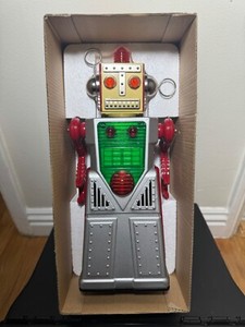 Robot Chief Smoky en fer blanc : jouet bump and go de style