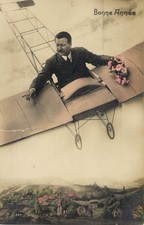 B585 New Year s greeting man sitting in studio prop airplane early photography