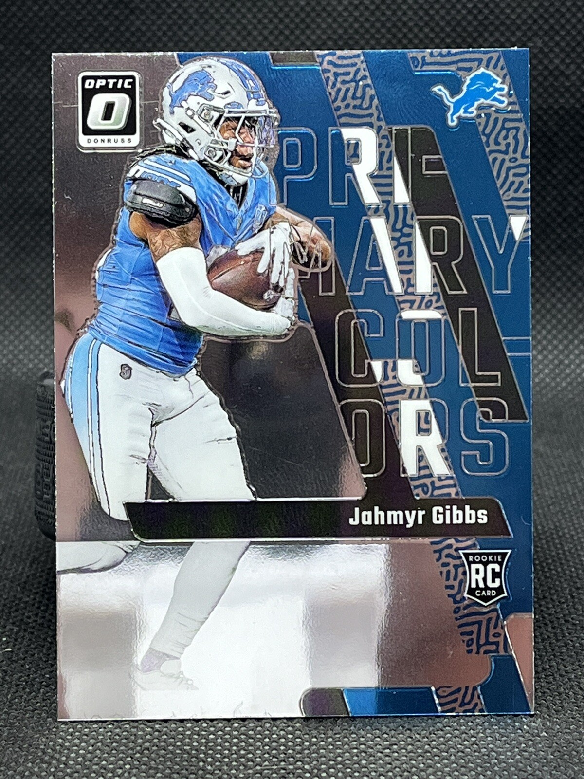 2023 Optic Football Jahmyr Gibbs PRIMARY COLORS ROOKIE #9 Detroit Lions RC