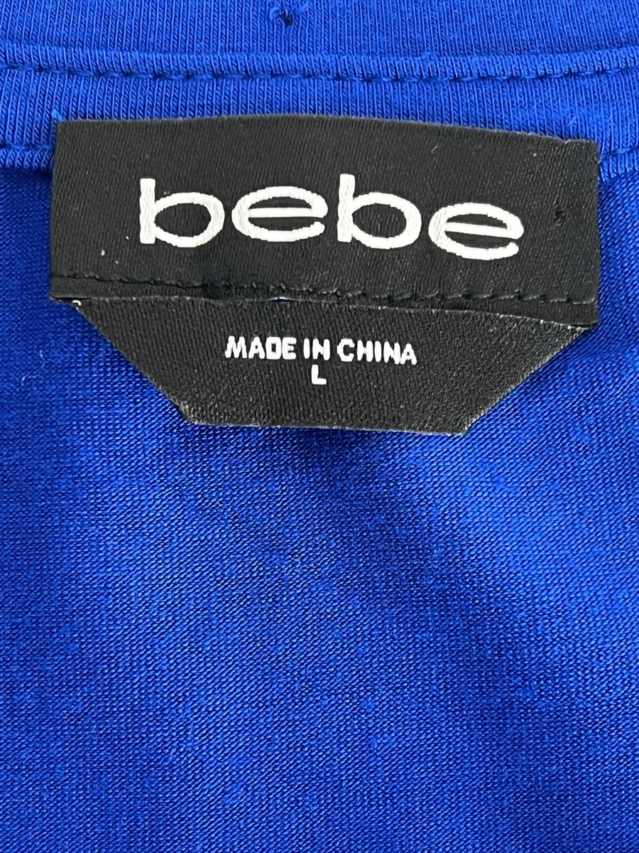 bebe Women Teen Size L Shirt Blue with Design and Logo In Clear