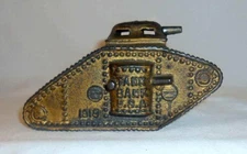 Antique AC Williams Cast Iron Gold Colored Tank Bank USA 1918 Still Penny Bank