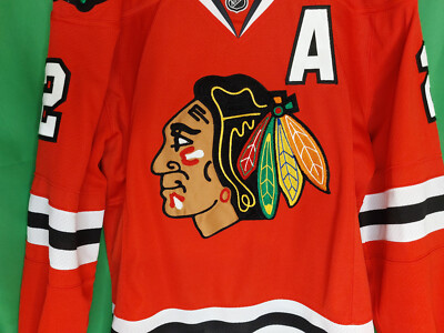 Medium Mens Duncan Keith Chicago Blackhawks jersey z authentic Reebok red  stitc