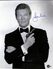 James Bond Roger Moore Signed 11x14 Photograph BECKETT