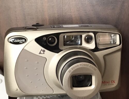 Cámara fotográfica vintage Canon Mini IX Aps con zoom en pleno funcionamiento - Imagen 1 de 12