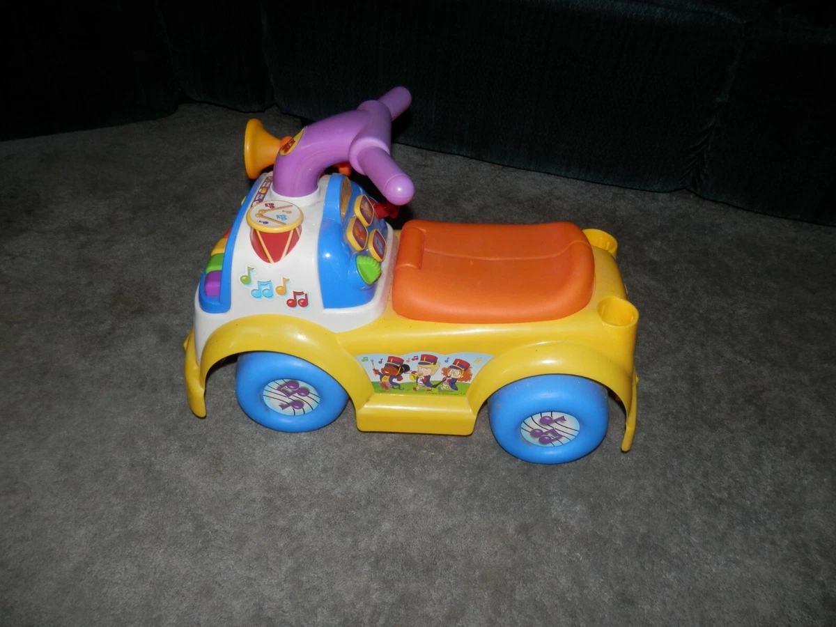 Fisher price parade ride on hotsell