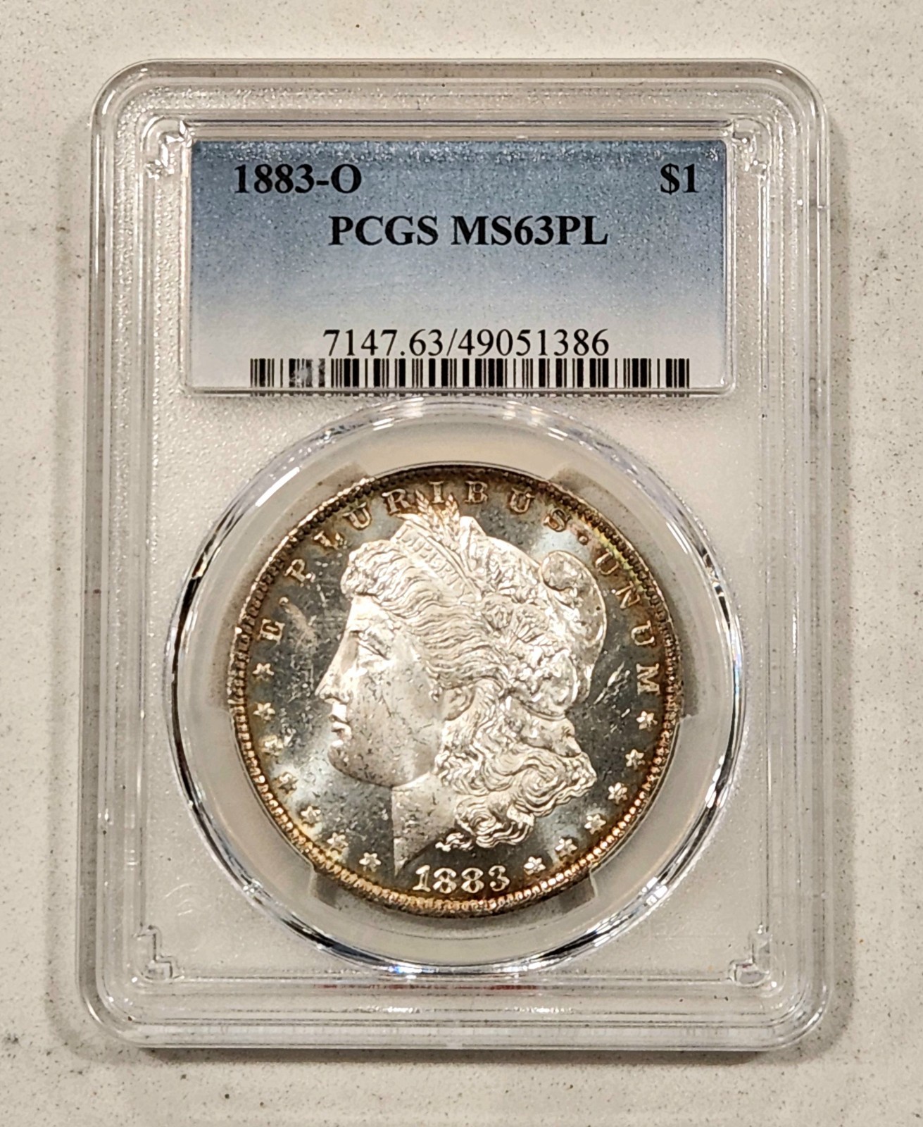 1883-O Morgan Silver Dollar PCGS MS63 PL Prooflike Rim Toned