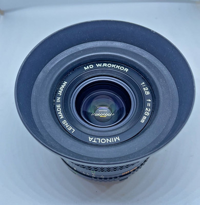 Minolta MD I 28mm f/2.8 Version mit 7 Linsen in 7 Gruppen und defekte SRT 100X