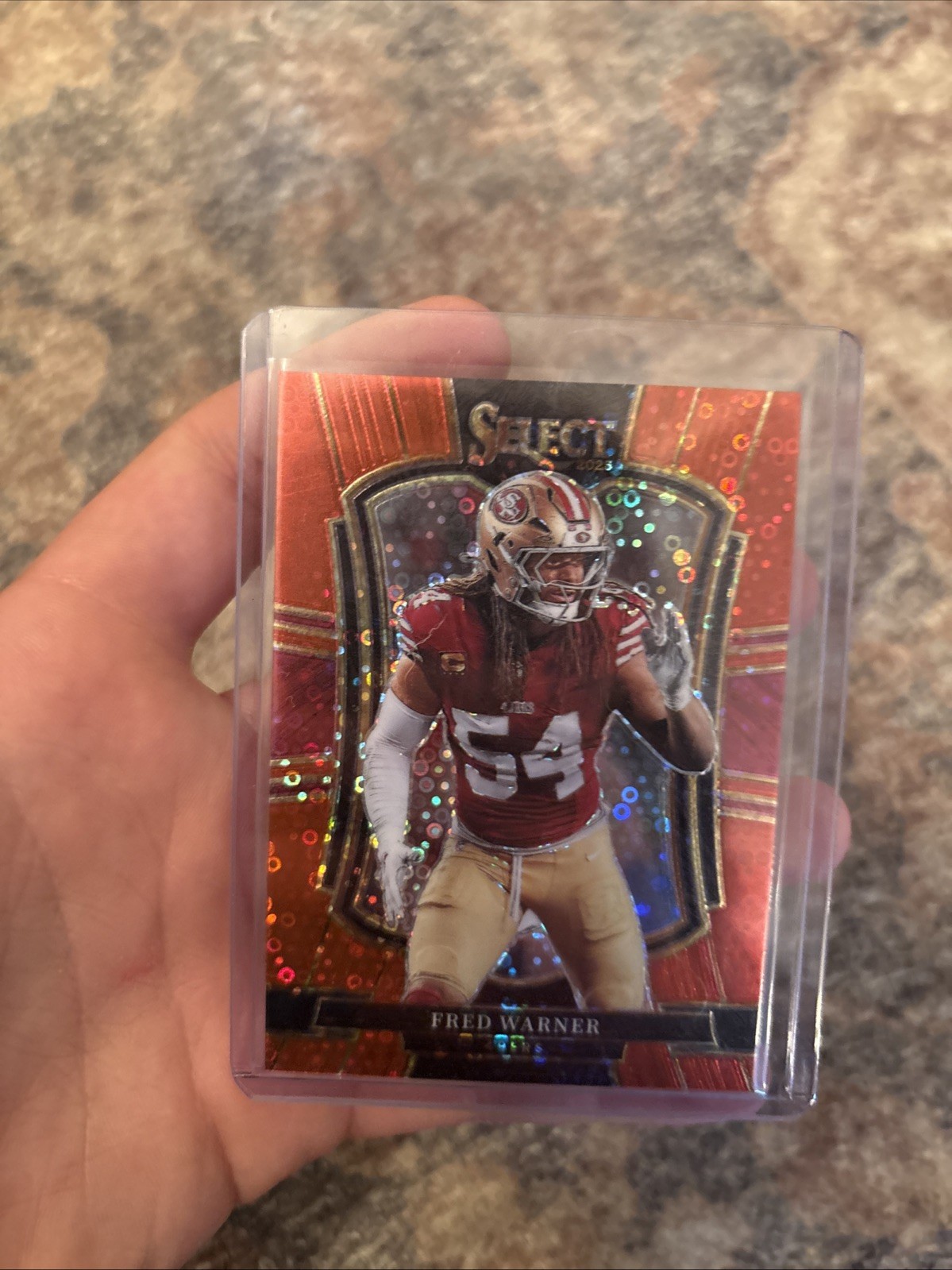 2025 Panini Select - Premier Level Fred Warner #118 Red Disco Prizm /49