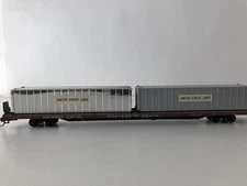 Athearn 7603 Trailer Train TTAX 970010 85’ Flat car with US Lines Containers