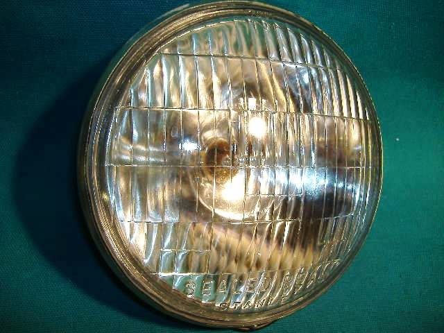 N NOS OEM Yamaha YA6 headlight 136-84320-60-00 Stanley A976 12V 35
